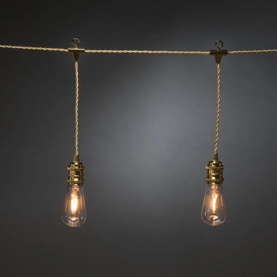Juhlavalosarja Konstsmide, IP20, 8 x LED, kulta/amber, tekstiilikaapeli, himmennin